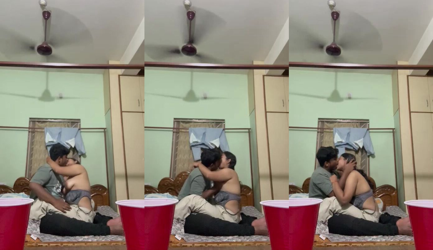 college student lovers romantic kissing in home