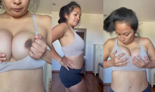 Young stepmom licking her own boobs